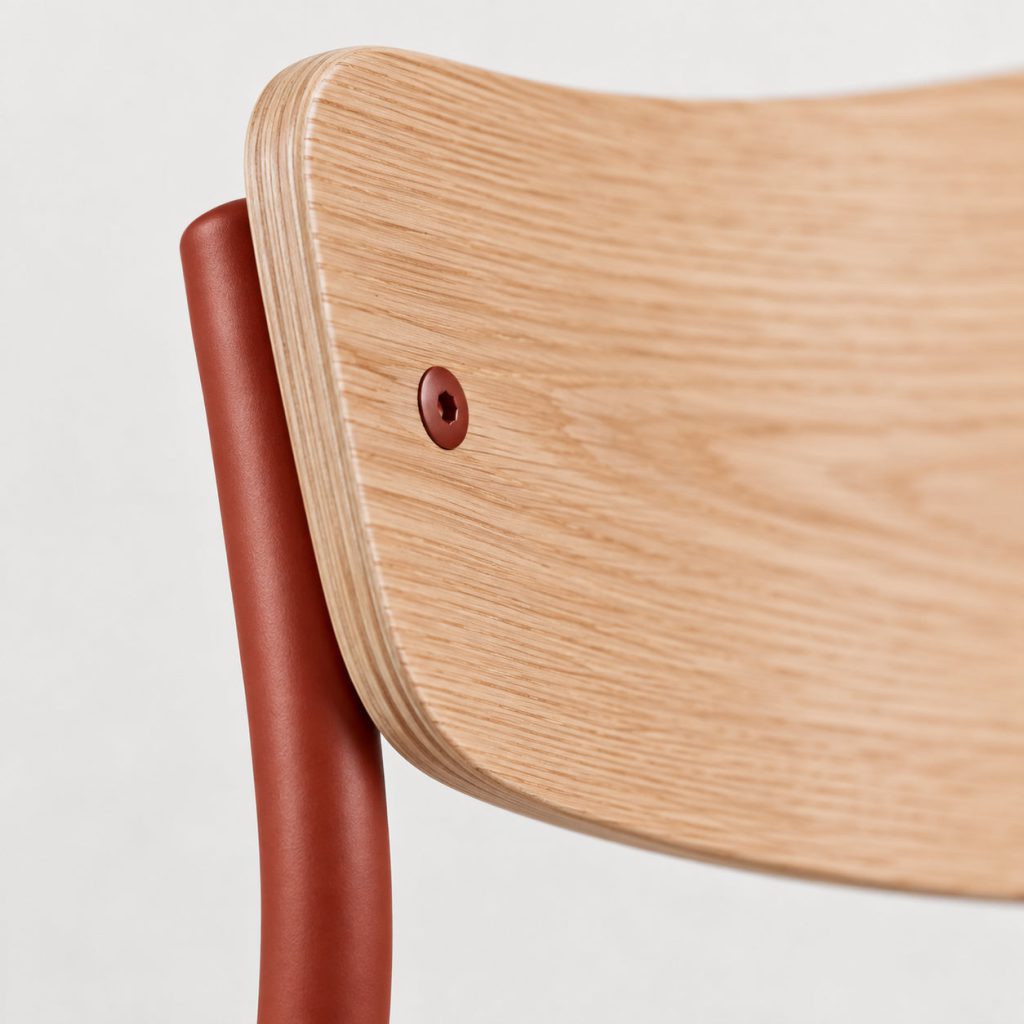 Stack Chair — A curved back.