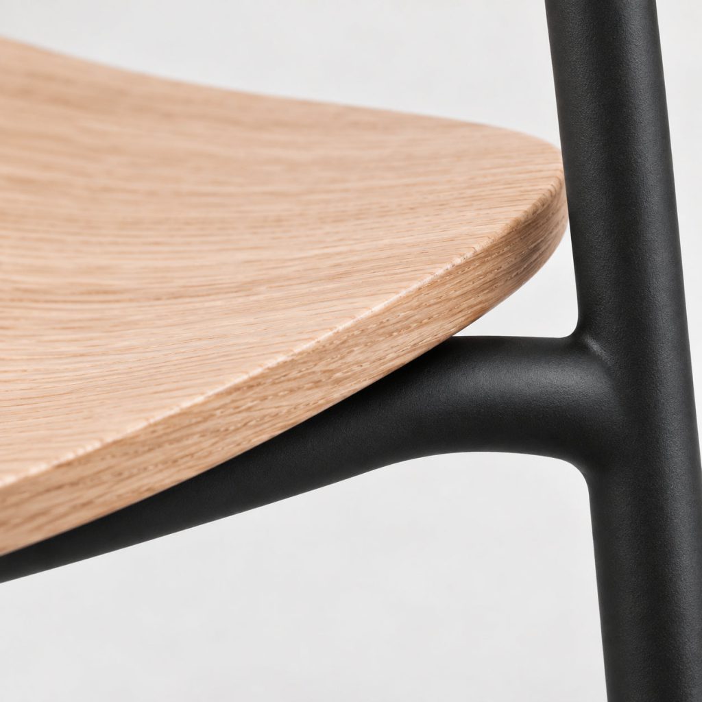 Stack Chair — Oak / Black finish detail